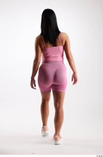 Reeta  1 back view dressed pink short leggings pink…
